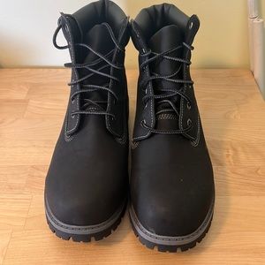 A pair of ozark trail boots